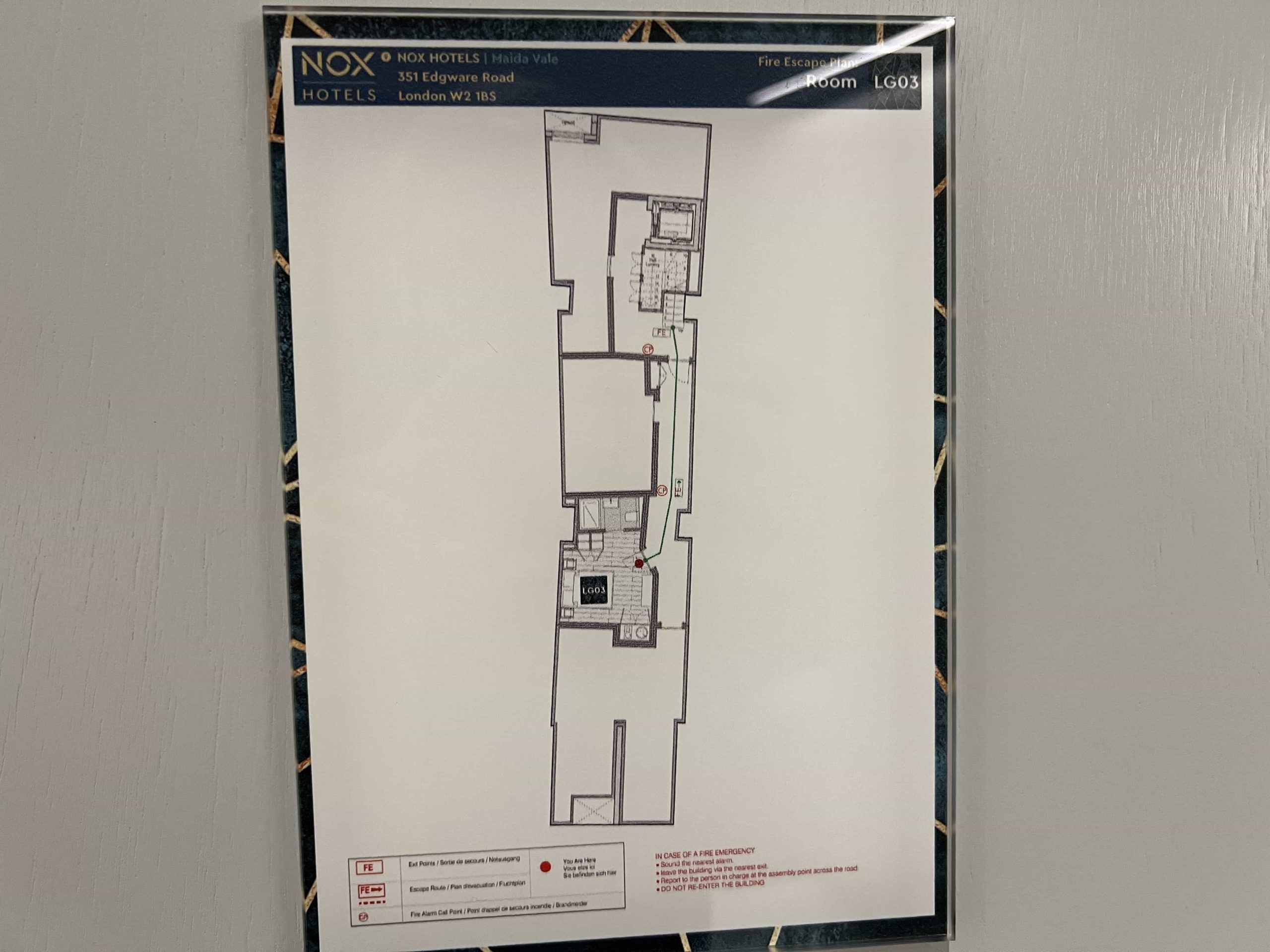 A fire escape plan on the back of a hotel room door