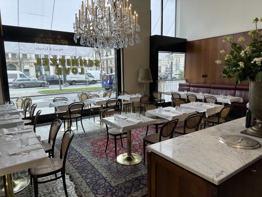 An Austrian-themed restaurant, with large windows looking out onto the street