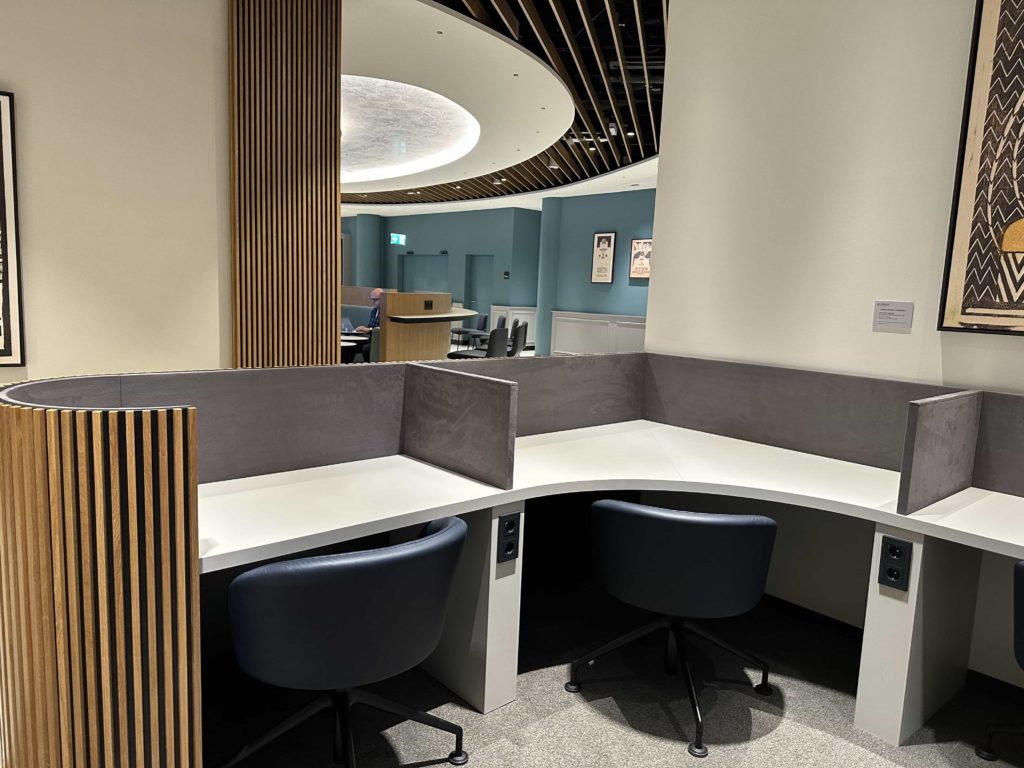 Workstation desks in a quiet corner of an airport lounge