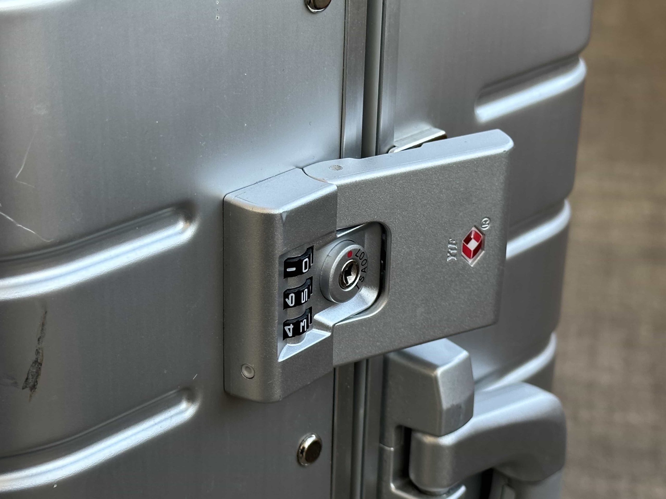 A latch with TSA combination lock on a suitcase