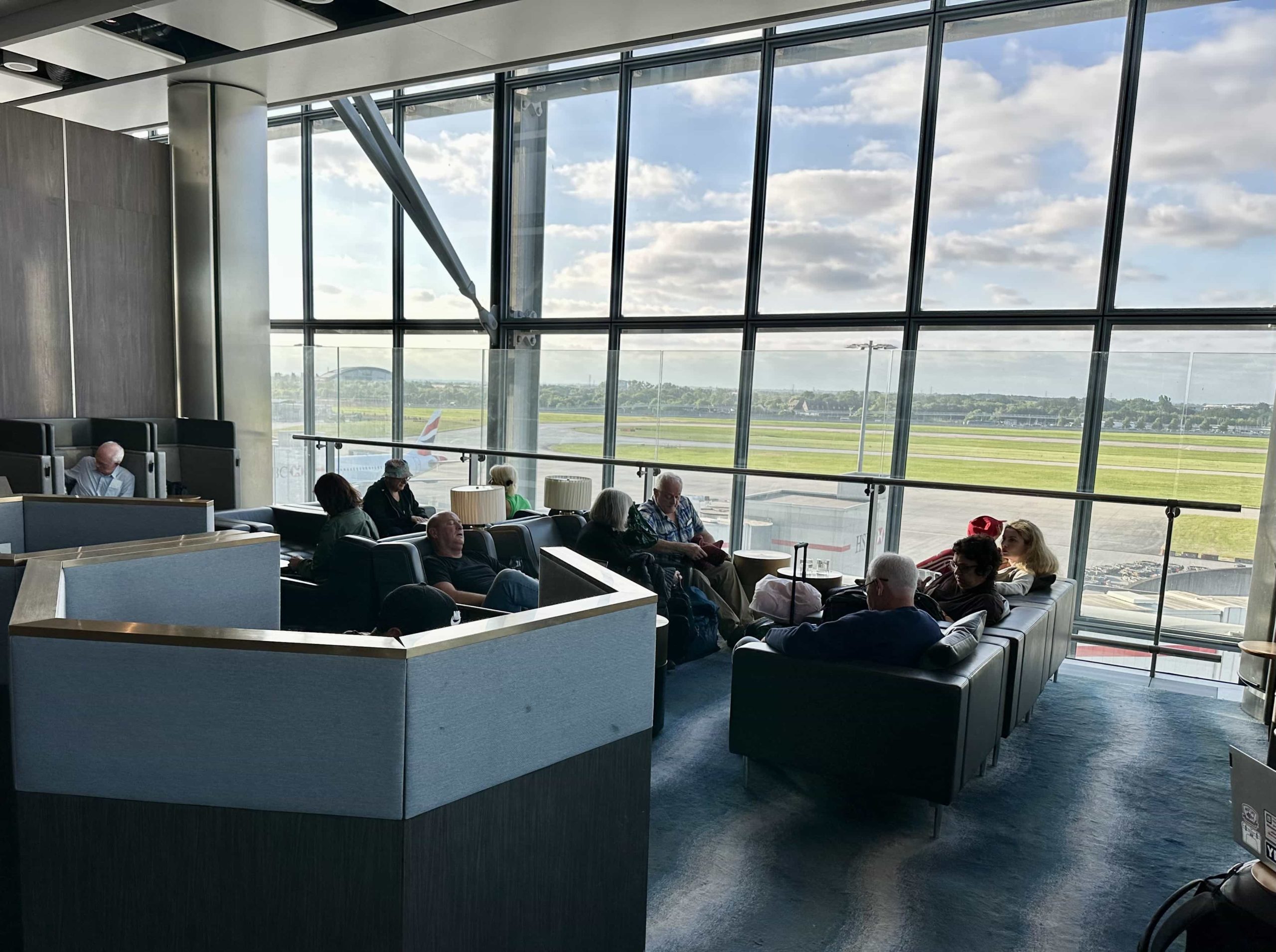 Casual seating in an airport lounge with great views overlooking the runway
