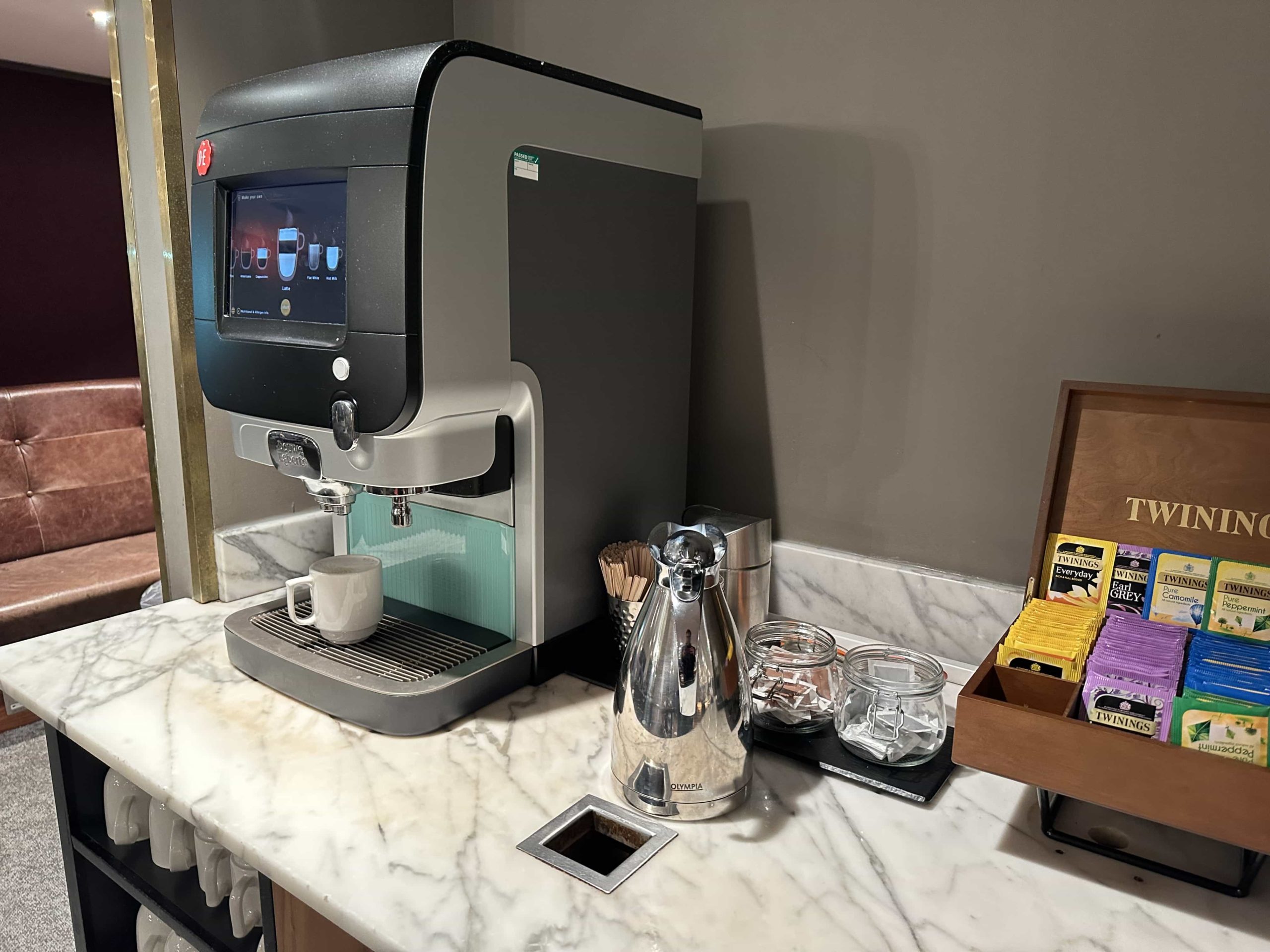 A coffee machine, plus various kinds of Twinings tea