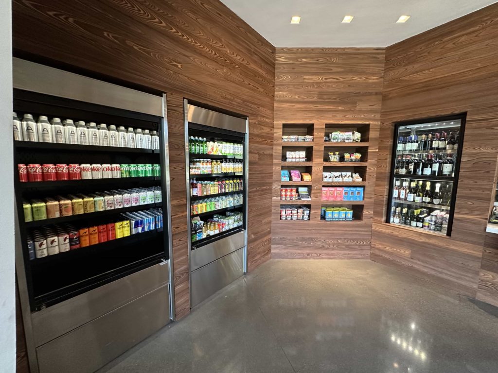 Fridges of soft and alcoholic drinks, and shelves of organic, high-end snacks